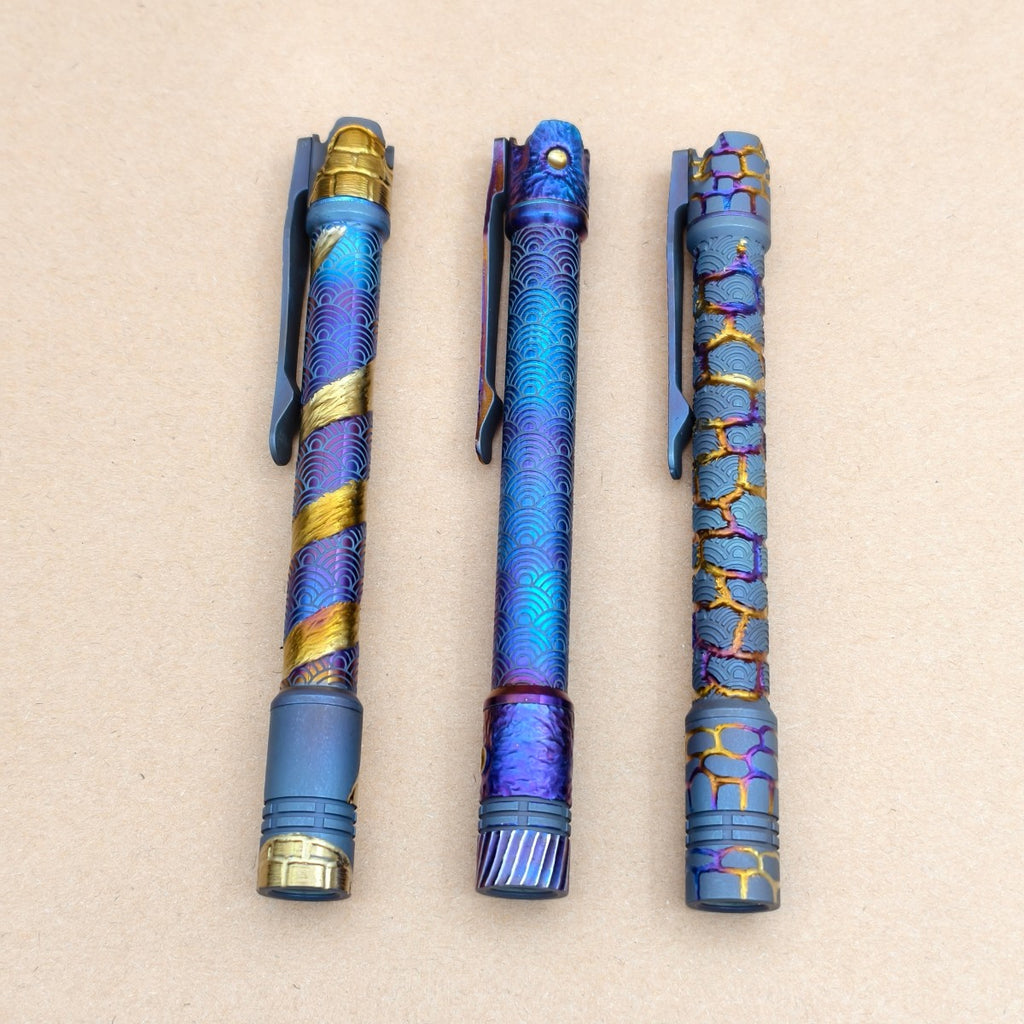 Penlight- - hand carved n heat anodized